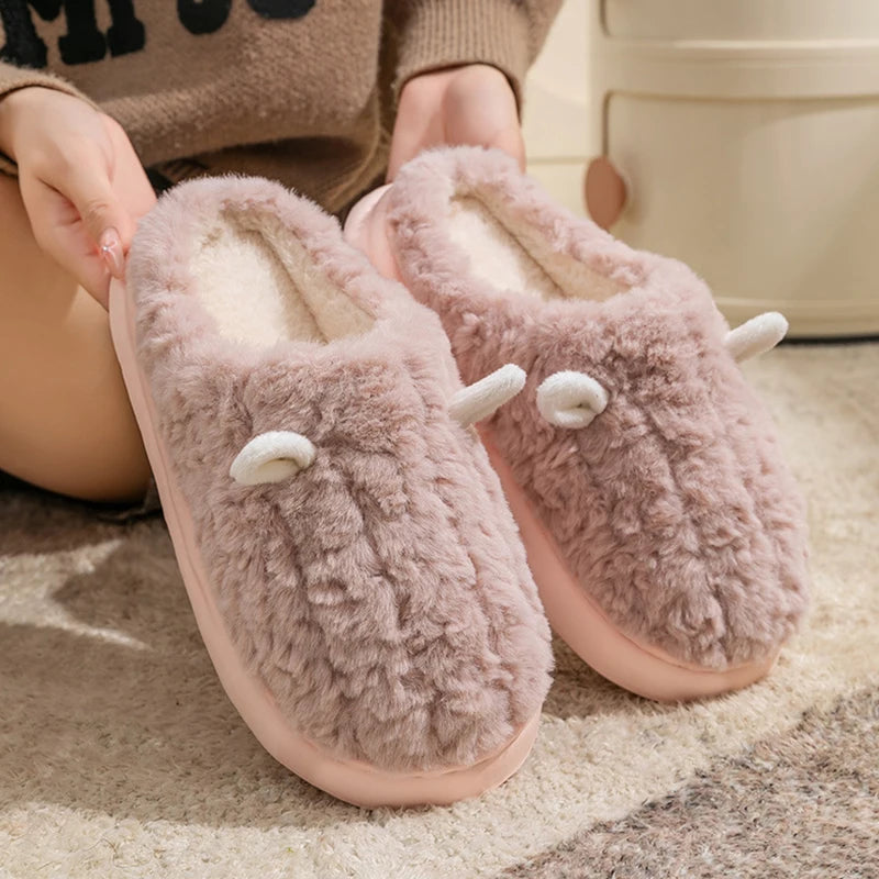 Cozy women's slippers featuring plush fleece lining for ultimate winter comfort. Made from soft cotton in a warm, neutral color. Ideal for lounging at home with 2