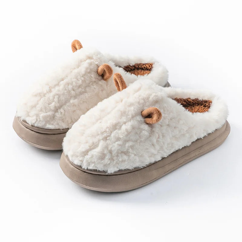 Cozy women's slippers in soft gray cotton, featuring plush fleece lining for ultimate winter comfort. Slip-on design with a cushioned sole, perfect for indoor 6