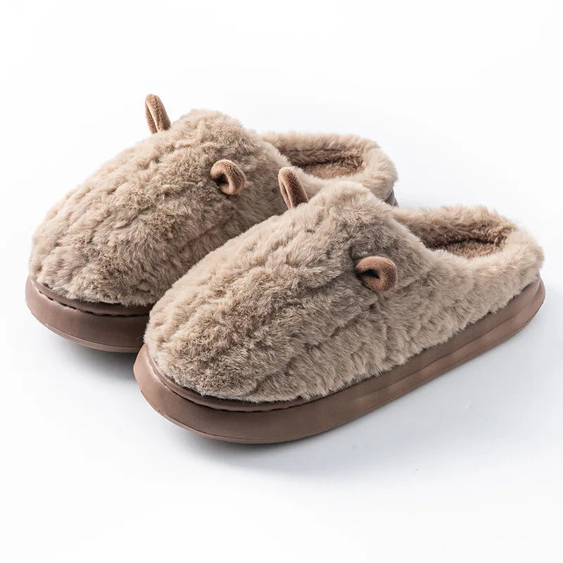 Cozy women's slippers made of soft cotton with plush fleece lining, designed for winter comfort. Features a warm, solid color for a stylish look while providing 8