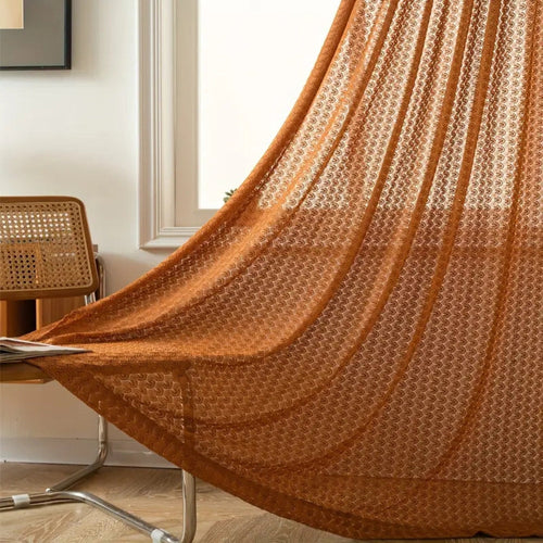 Boho chic crochet curtain in earthy orange, made from a soft microfiber blend. Measures 52 x 84 inches, featuring a delicate crochet design that 0