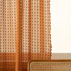 Boho chic earthy orange crochet curtain made from a soft microfiber blend, featuring intricate patterns. Measures 52 x 84 inches, perfect for adding a 5
