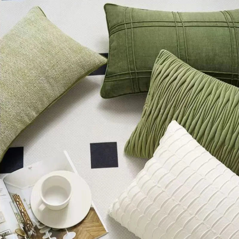 Decorative green pillow cover featuring a modern geometric design, made from soft, durable fabric. Ideal for adding a stylish accent to your home decor. 1