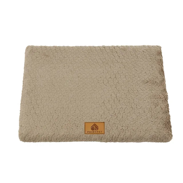 Large dog bed mat in ultra-comfort plush material, featuring a non-slip design. Soft gray color for a cozy retreat, suitable for all breeds. 0