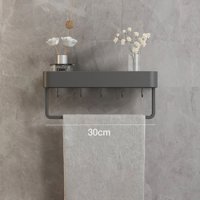 Elegant gray floating shelves designed for bathroom wall-mount storage. Crafted from durable wood, featuring a sleek, minimalist design for easy organization and display of toiletries 6