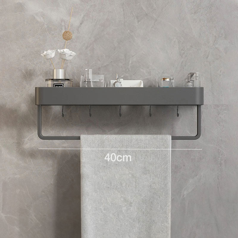 Elegant gray floating shelves designed for bathroom wall-mount storage. Crafted from durable wood, featuring a sleek, minimalist design for easy organization and display of toiletries 7