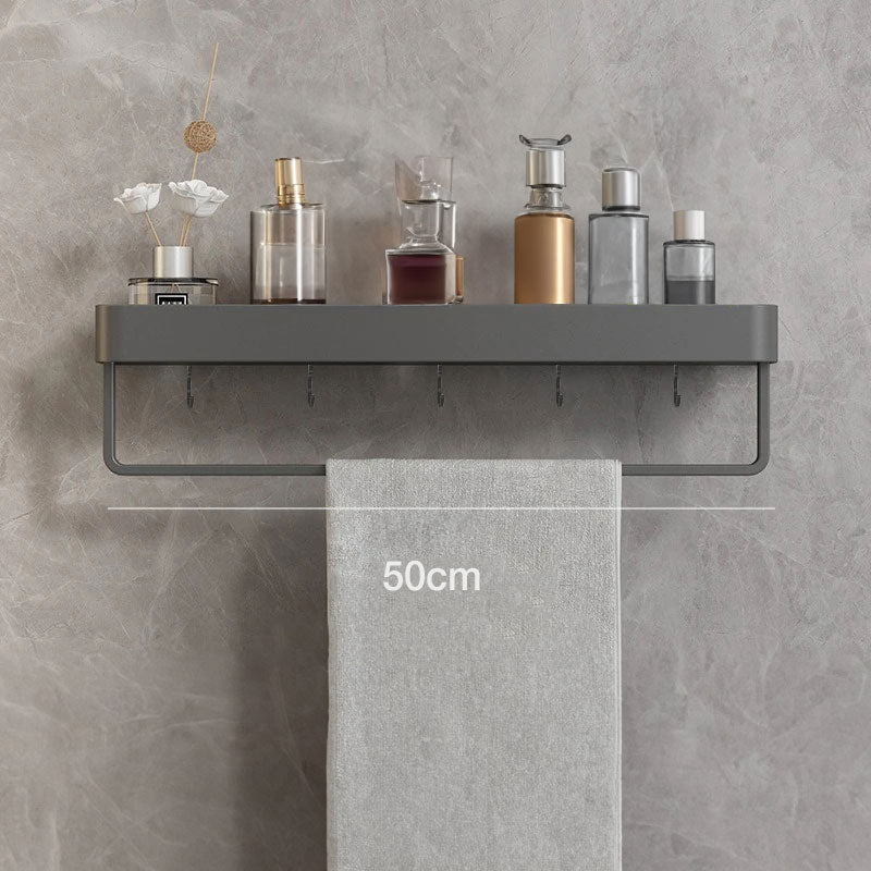 Elegant gray floating shelves designed for bathroom wall-mount storage. Crafted from durable wood, featuring a sleek, minimalist design for easy organization and display of toiletries 8