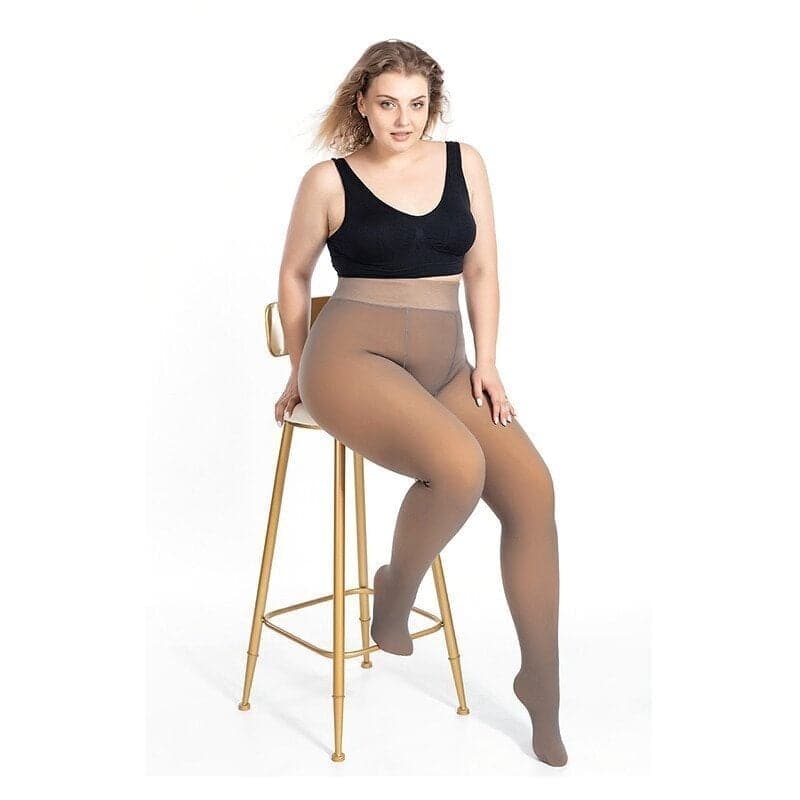Stretchy nylon blend fleece pantyhose in a transparent look, designed for warm winter wear. One size fits most, offering comfort and style for cold 10