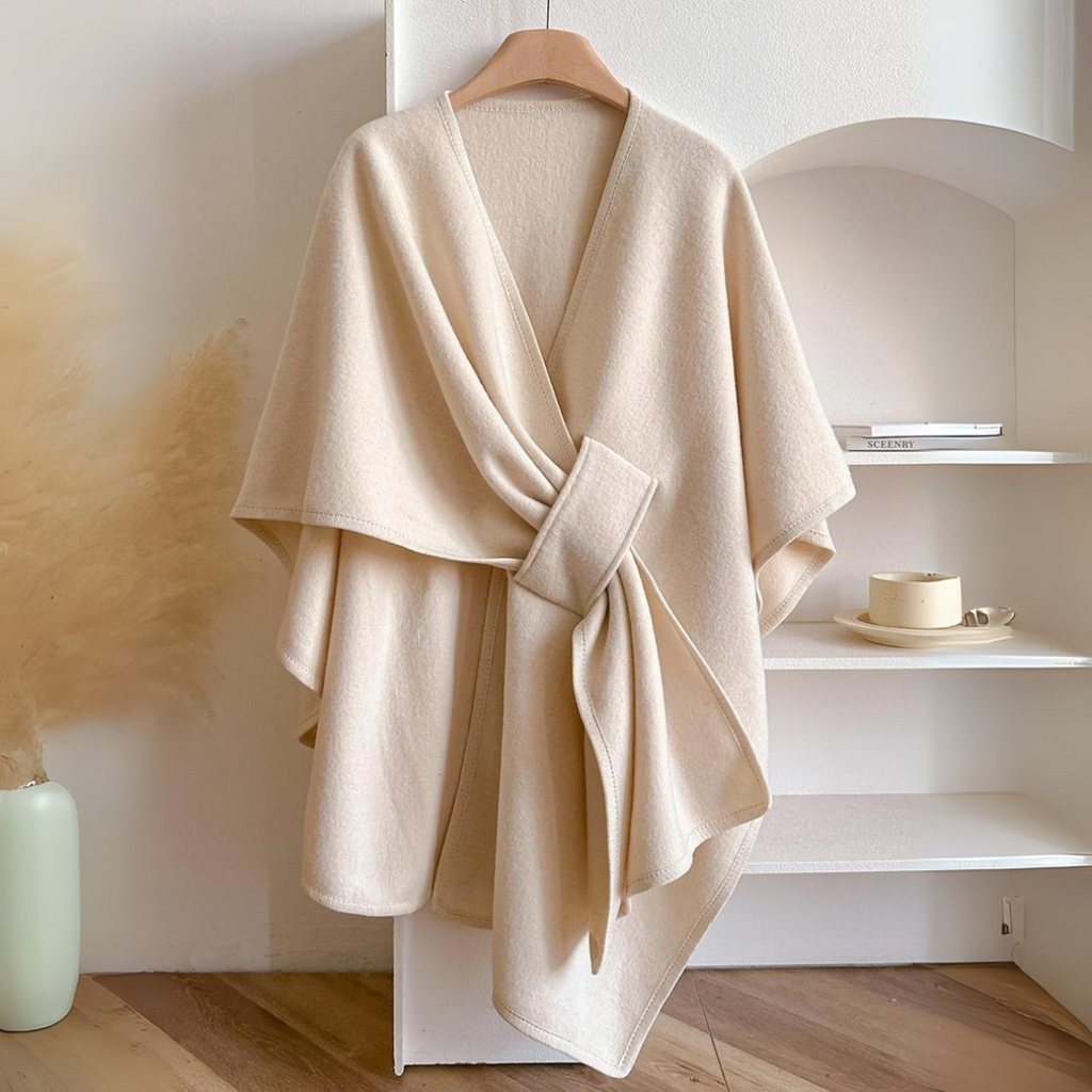 Cozy lightweight fleece shawl wrap in a soft gray color, featuring an elegant drape design. Perfect for adding warmth and style, ideal for layering 1