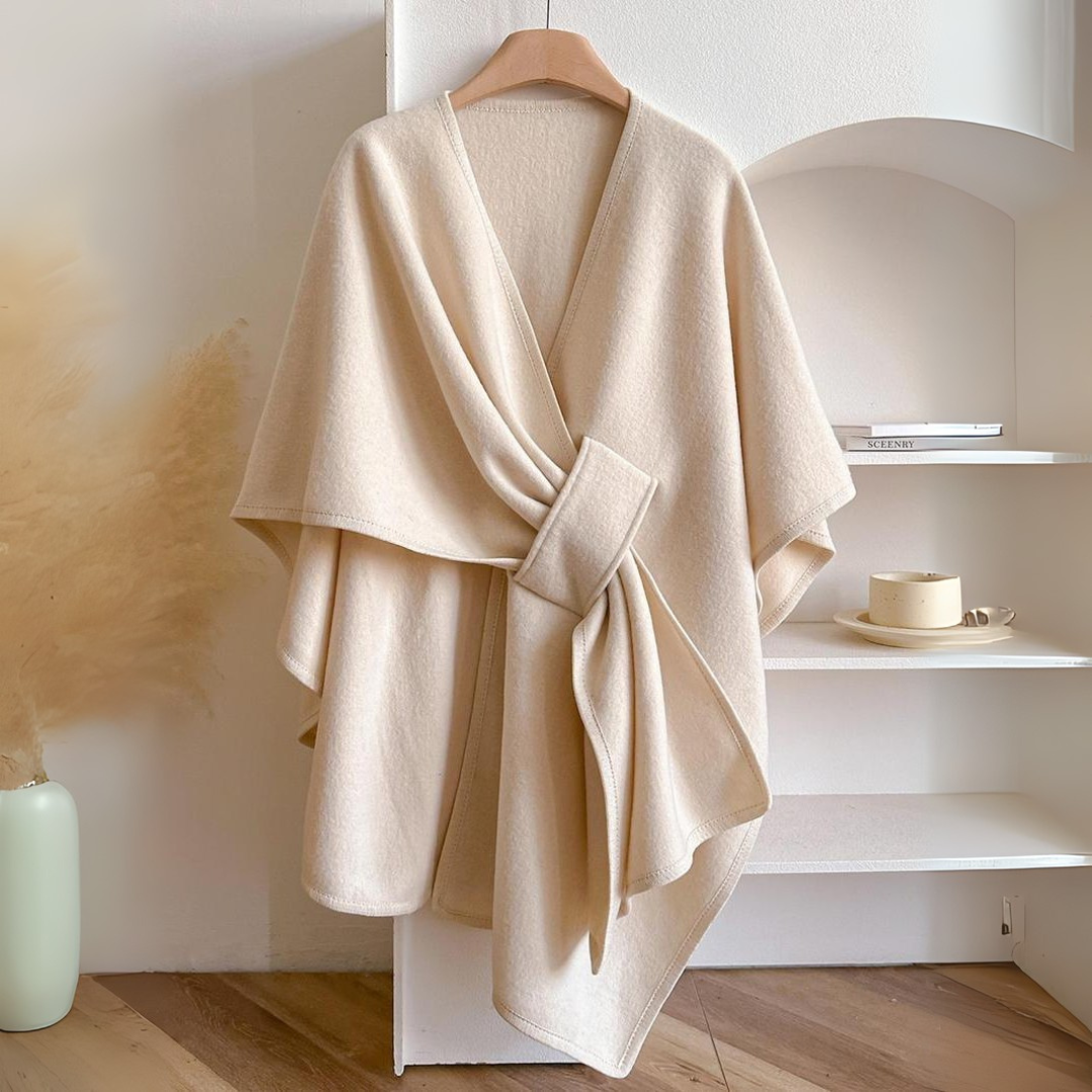 Cozy lightweight fleece shawl wrap in a soft gray color, featuring an elegant drape design. Perfect for adding warmth and style, ideal for layering 1
