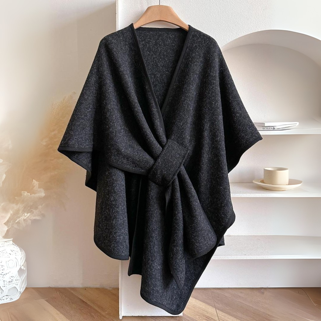 Cozy lightweight fleece shawl wrap in a soft gray hue, featuring a draped design for stylish comfort. Ideal for layering, this versatile accessory adds 6