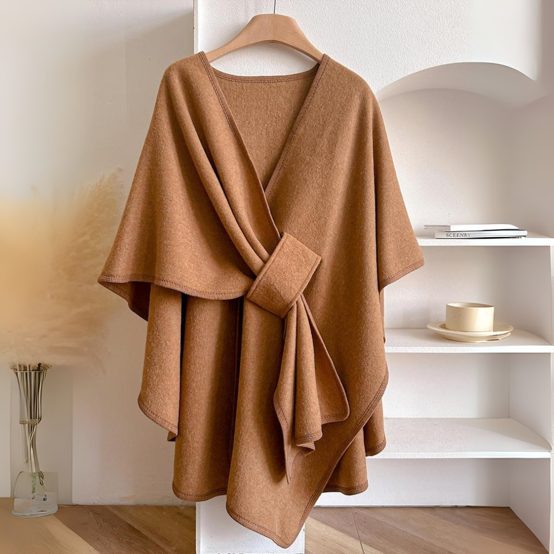 Cozy lightweight fleece shawl wrap in soft gray, perfect for stylish comfort. Features a draped design for easy layering, making it ideal for chilly 7