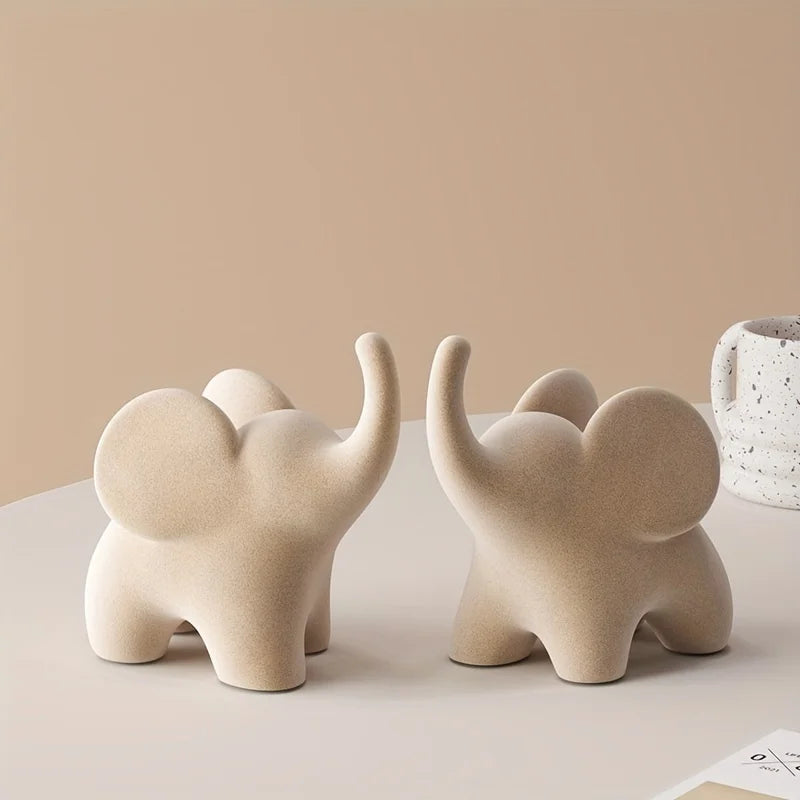 Flocked resin elephant figurine – Soft gray – Charming home decor – Ideal for living room or bedroom – 6 x 4 x 5 in 1
