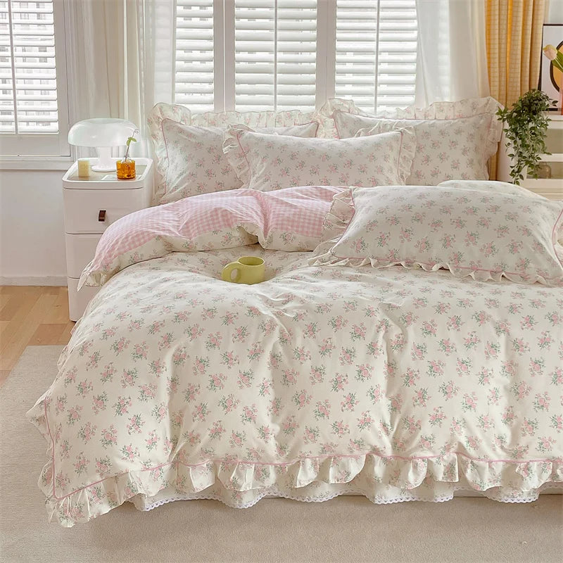 Queen-sized floral cotton duvet cover set featuring a delicate ruffle edge, designed for cozy bedrooms. The soft fabric showcases a vibrant floral pattern in pastel colors 4