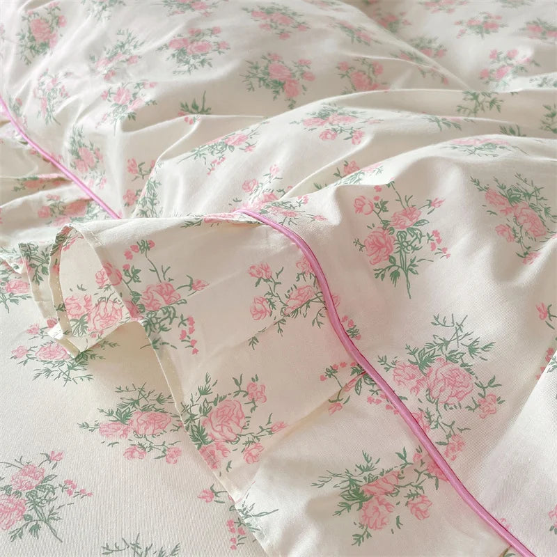 Floral cotton duvet cover queen set featuring a delicate ruffle edge, perfect for adding a cozy touch to bedrooms. The soft fabric showcases a vibrant floral 6