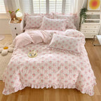 Pink floral duvet set featuring delicate ruffles, made from soft cotton. Ideal for a cozy queen size bed, it adds a charming touch to any bedroom 1