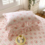Cozy queen size duvet set featuring a soft pink floral pattern with playful ruffles. Made from high-quality cotton for comfort and breathability, perfect for 5