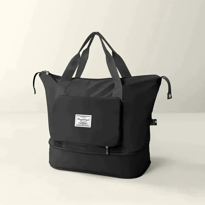 Spacious foldable travel bag for women in navy blue, made from durable polyester. Features multiple compartments for organization, sturdy handles, and a sleek design 4
