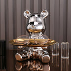 Adorable galvanized piggy bank featuring a bear doll shelf, perfect for saving coins. The shiny silver finish adds a playful touch to any room, making 3