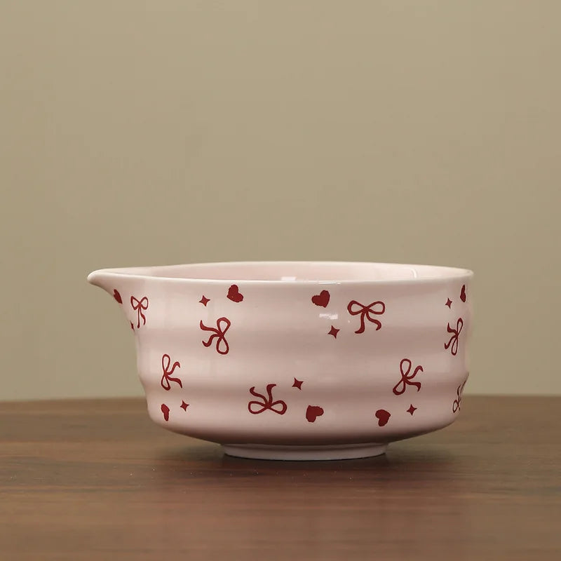 Hand-painted matcha tea set featuring a beautifully crafted bowl and whisk. The set showcases an elegant aesthetic with delicate floral designs in soft green and cream colors 15