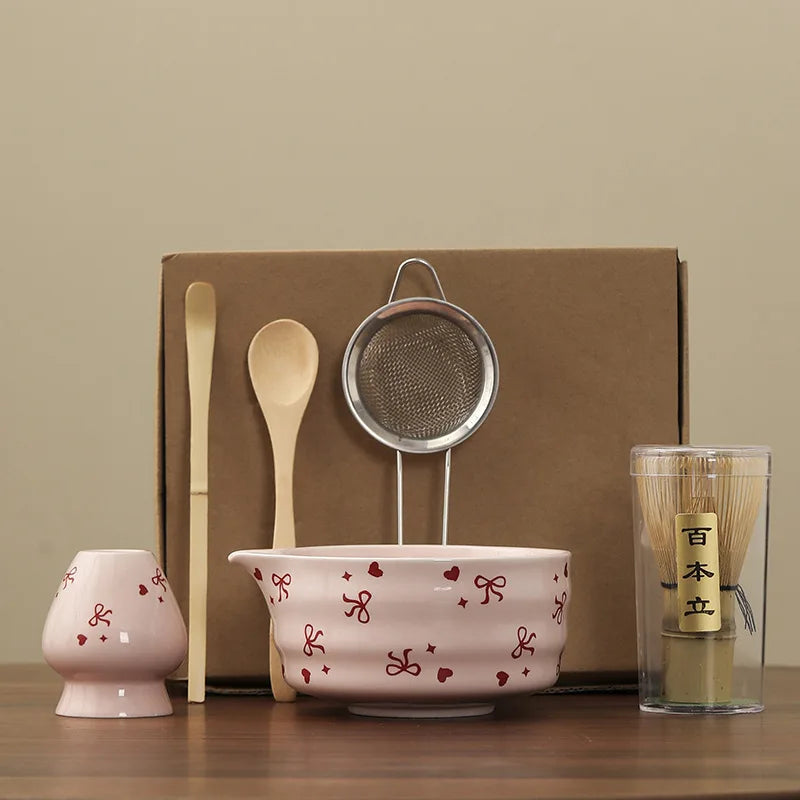 Hand-painted matcha tea set featuring a beautifully crafted bowl and whisk. The set showcases an elegant aesthetic with delicate floral designs in soft green and cream colors 17