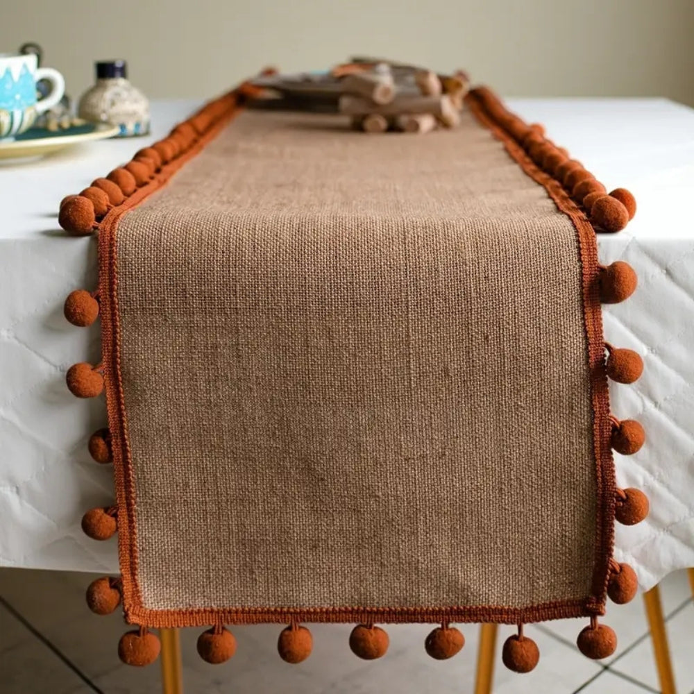 Jute table runner – Durable material – Vibrant orange pom-poms – Bohemian style for dining or living room décor 0