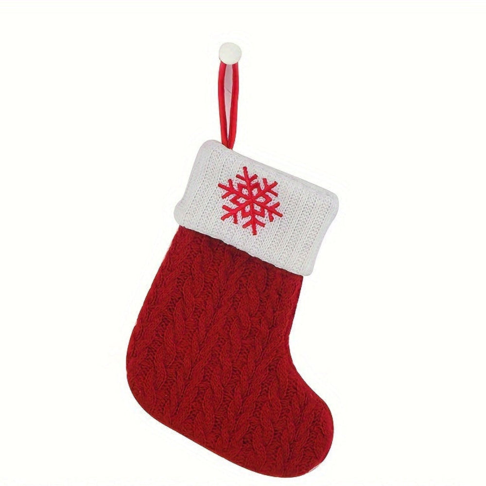Knit monogram personalized Christmas stocking in festive red with white lettering. Classic knit texture adds warmth, perfect for holiday decor. Ideal for hanging by the 11