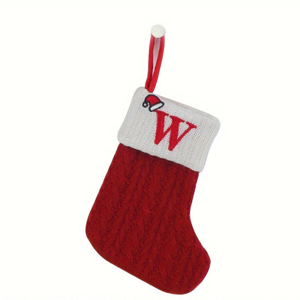 Knit monogram personalized Christmas stocking in festive red with white lettering. Classic knit texture adds warmth, perfect for holiday decor. Ideal for hanging by the 13