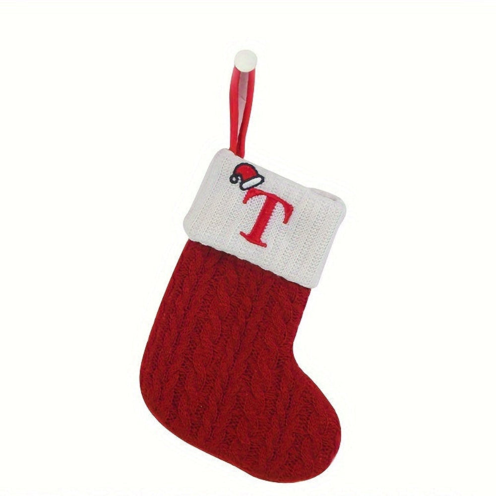 Knit monogram personalized Christmas stocking in festive red with white lettering. Classic knit texture adds warmth, perfect for holiday decor. Ideal for hanging by the 14