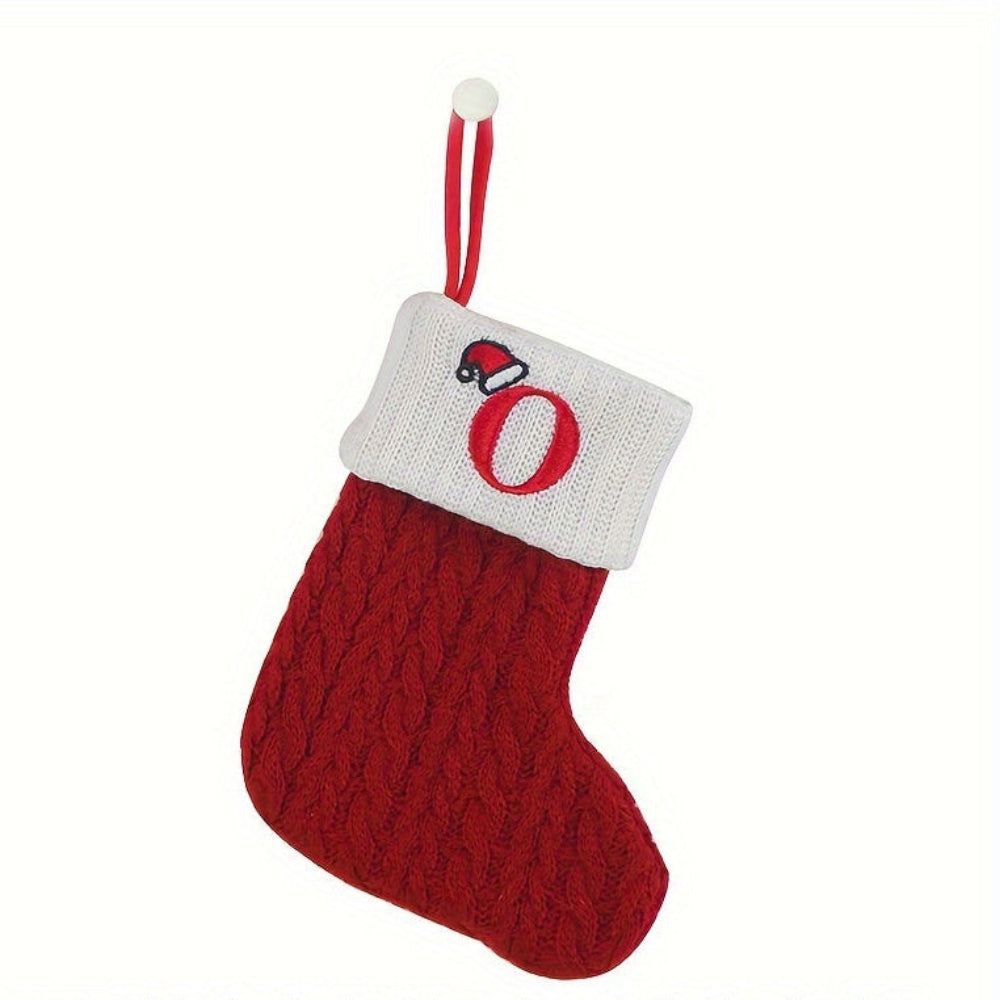 Knit monogram personalized Christmas stocking in festive red with white lettering. Classic knit texture adds warmth, perfect for holiday decor. Ideal for hanging by the 15