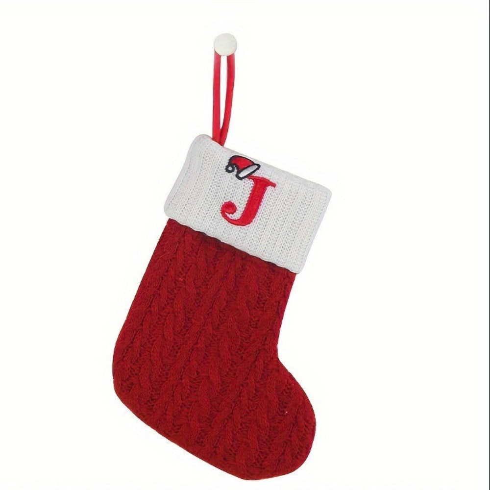 Knit monogram personalized Christmas stocking in festive red with white lettering. Classic knit texture adds warmth, perfect for holiday decor. Ideal for hanging by the 17