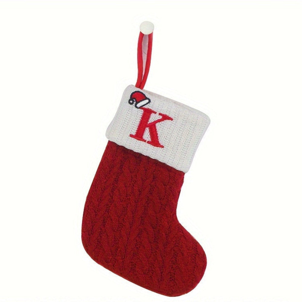 Knit monogram personalized Christmas stocking in festive red with white lettering. Classic knit texture adds warmth, perfect for holiday decor. Ideal for hanging by the 19