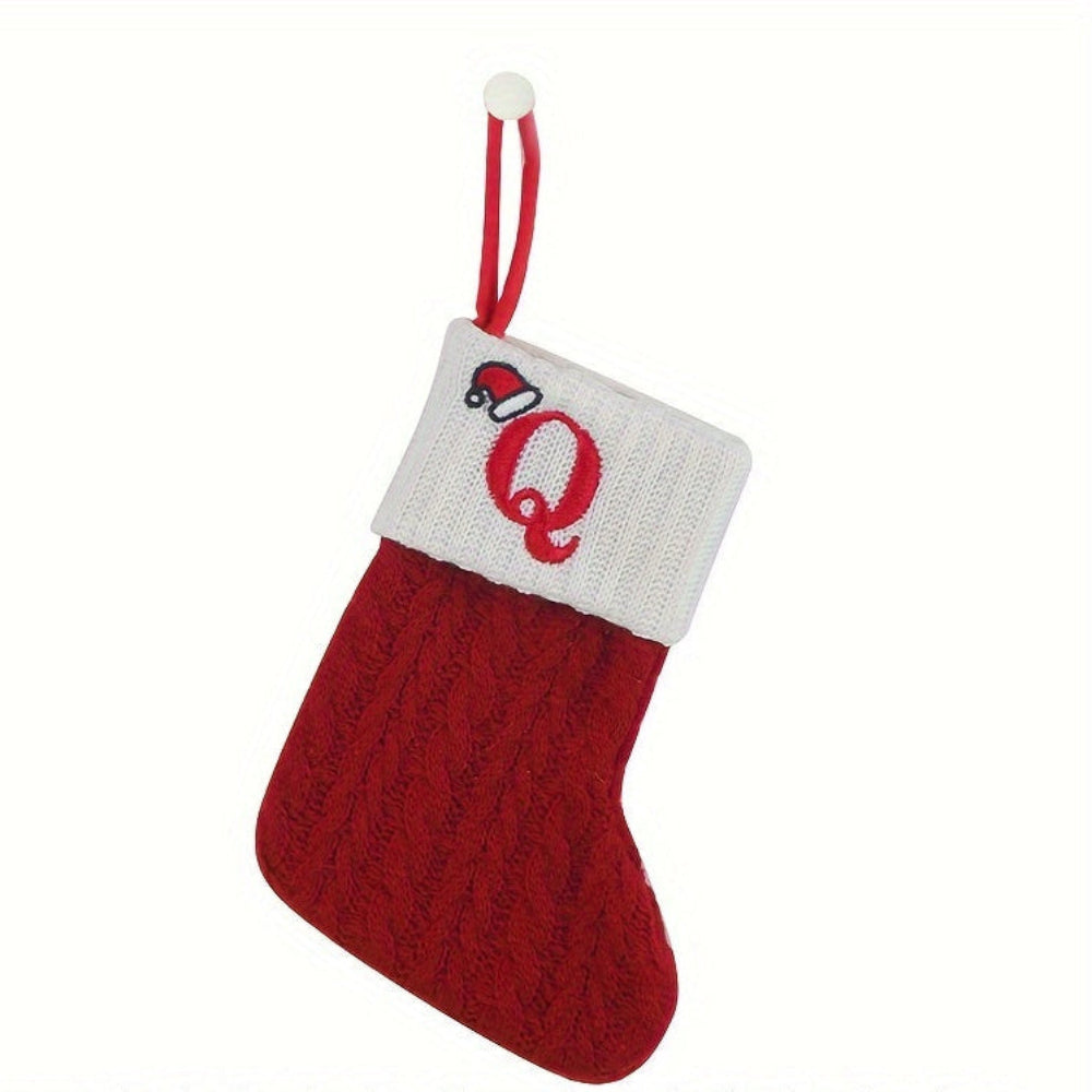 Knit monogram personalized Christmas stocking in festive red with white lettering. Classic knit texture adds warmth, perfect for holiday decor. Ideal for hanging by the 25