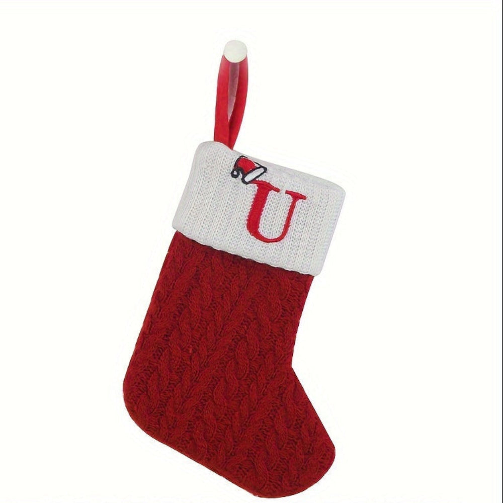 Knit monogram personalized Christmas stocking in festive red with white lettering. Classic knit texture adds warmth, perfect for holiday decor. Ideal for hanging by the 26