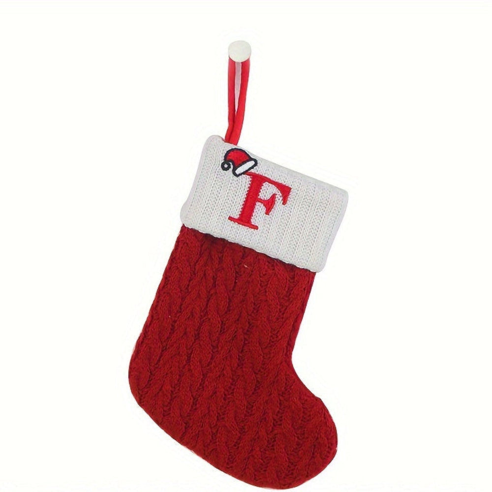 Knit monogram personalized Christmas stocking in festive red with white lettering. Classic knit texture adds warmth, perfect for holiday decor. Ideal for hanging by the 5