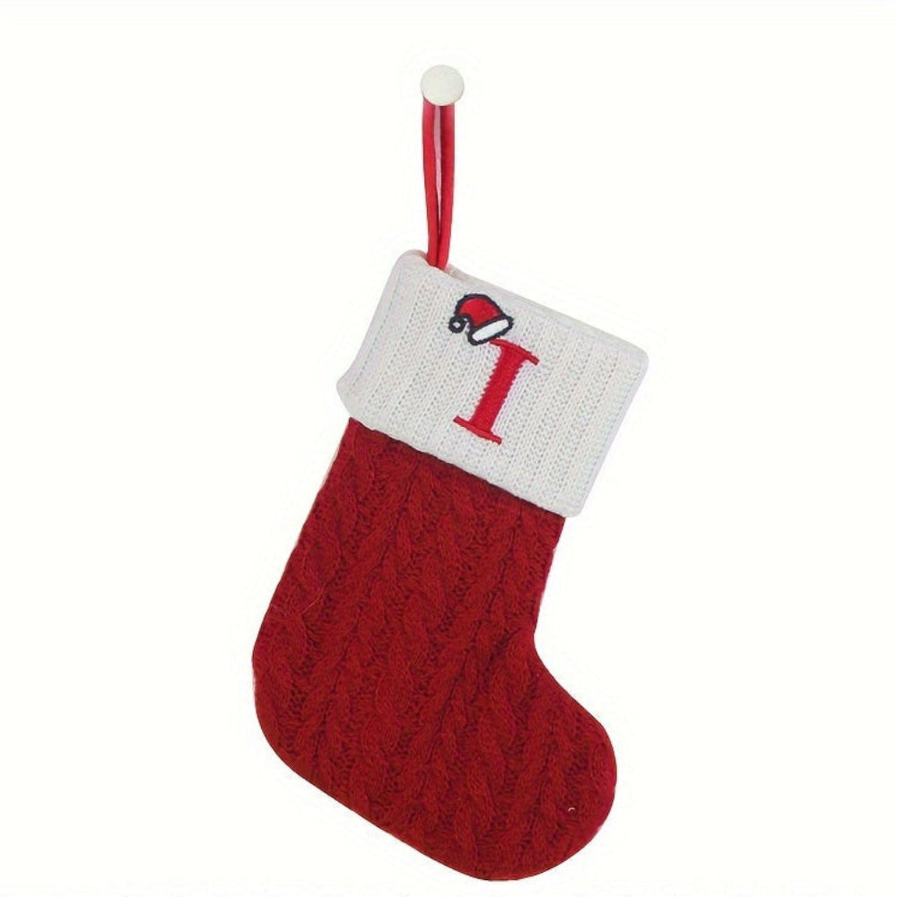 Knit monogram personalized Christmas stocking in festive red with white lettering. Classic knit texture adds warmth, perfect for holiday decor. Ideal for hanging by the 8