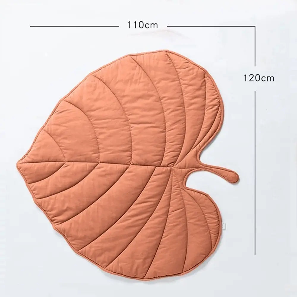 Leaf-shaped dog cooling mat in vibrant green, made of soft and breathable fabric. Features a washable design for easy care, providing comfort and relief for pets 10