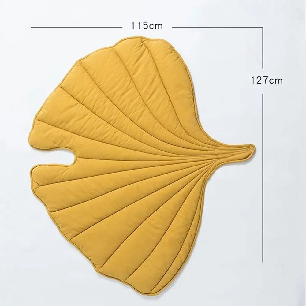 Leaf-shaped dog cooling mat in soft, breathable fabric. Features a washable design with a vibrant green leaf pattern, providing comfort and style for your pet. 7