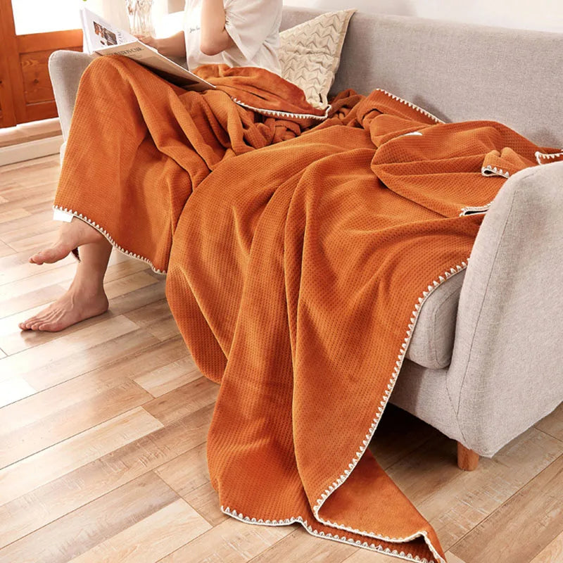 Plush luxury velvet blanket in a rich solid color, perfect for all seasons. Soft and cozy throw adds warmth and elegance to any setting, ideal for 0