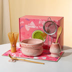 Elegant 7-piece matcha set featuring a beautifully crafted ceramic bowl and whisk, adorned with delicate cherry blossom designs. The set includes a bowl, whisk 0