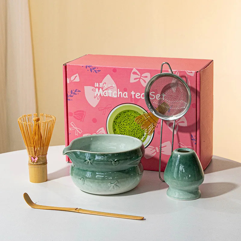 Elegant 7-piece matcha set featuring a beautifully crafted ceramic bowl and whisk, adorned with delicate cherry blossom designs. The set includes a bowl, whisk 12
