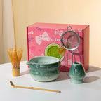Elegant 7-piece matcha set featuring a beautifully crafted ceramic bowl and whisk, adorned with delicate cherry blossom designs. The set includes a bowl, whisk 12