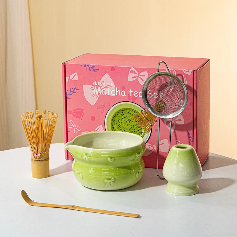 Elegant 7-piece matcha set featuring a beautifully crafted ceramic bowl and whisk, adorned with delicate cherry blossom designs. The set includes a bowl, whisk 13