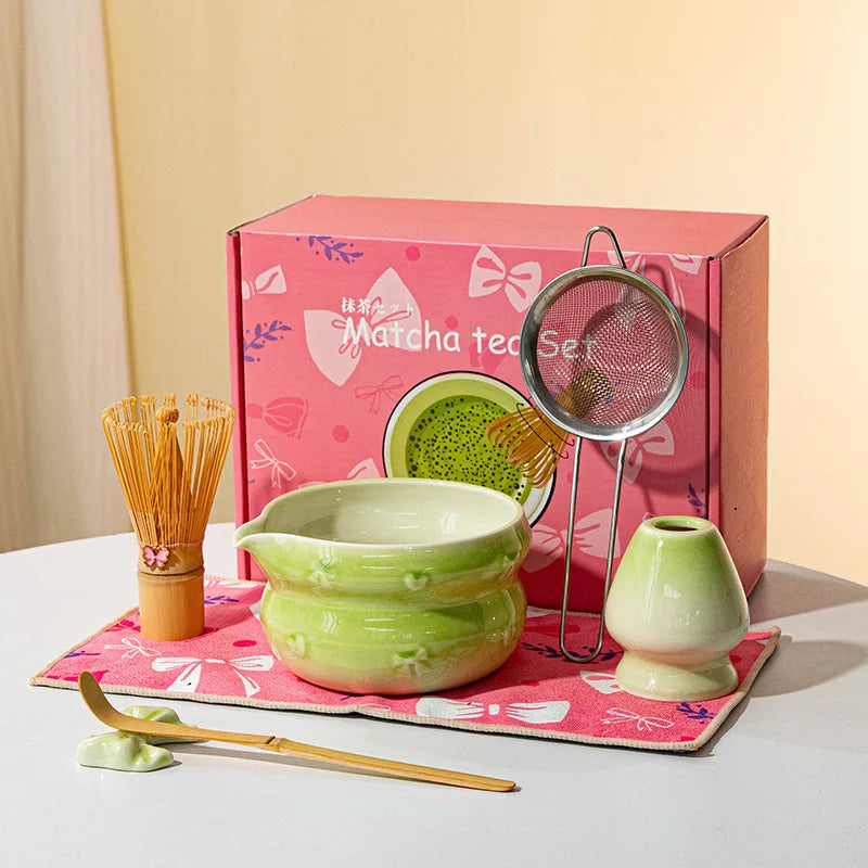 Elegant 7-piece matcha set featuring a beautifully crafted ceramic bowl and whisk, adorned with delicate cherry blossom designs. The set includes a bowl, whisk 22