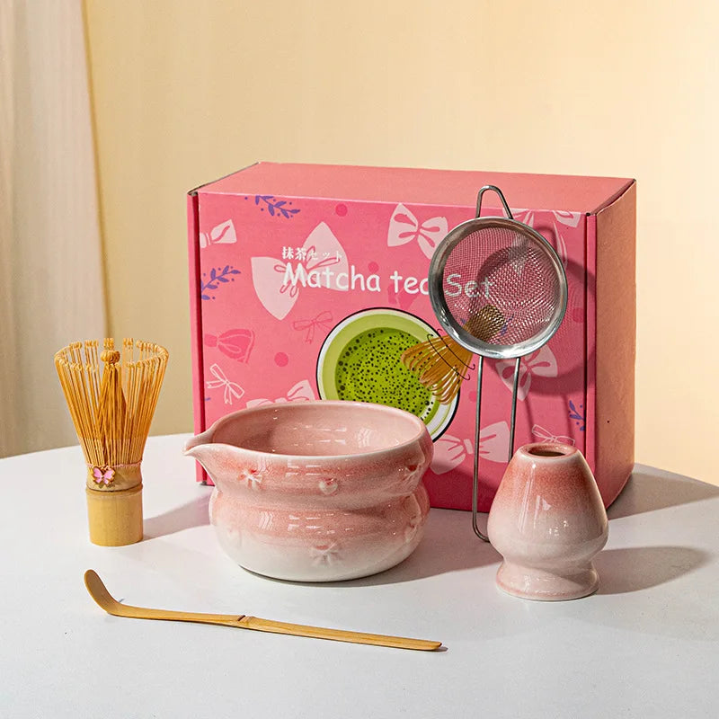 Elegant 7-piece matcha set featuring a beautifully crafted ceramic bowl and whisk, adorned with delicate cherry blossom designs. The set includes a bowl, whisk 25