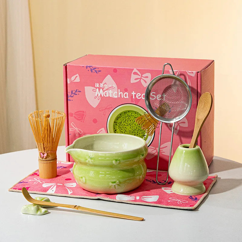 Elegant 7-piece matcha set featuring a beautifully crafted ceramic bowl and whisk, adorned with delicate cherry blossom designs. The set includes a bowl, whisk 26