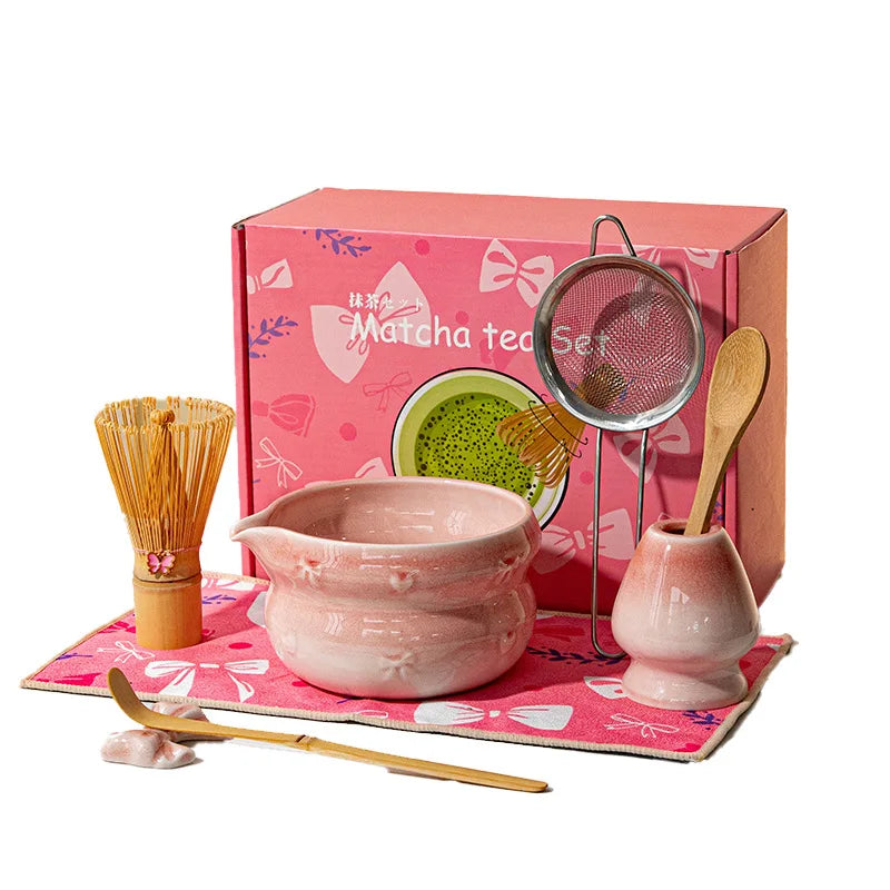 Elegant 7-piece matcha set featuring a beautifully crafted ceramic bowl and whisk, adorned with delicate cherry blossom designs. The set includes a bowl, whisk 4