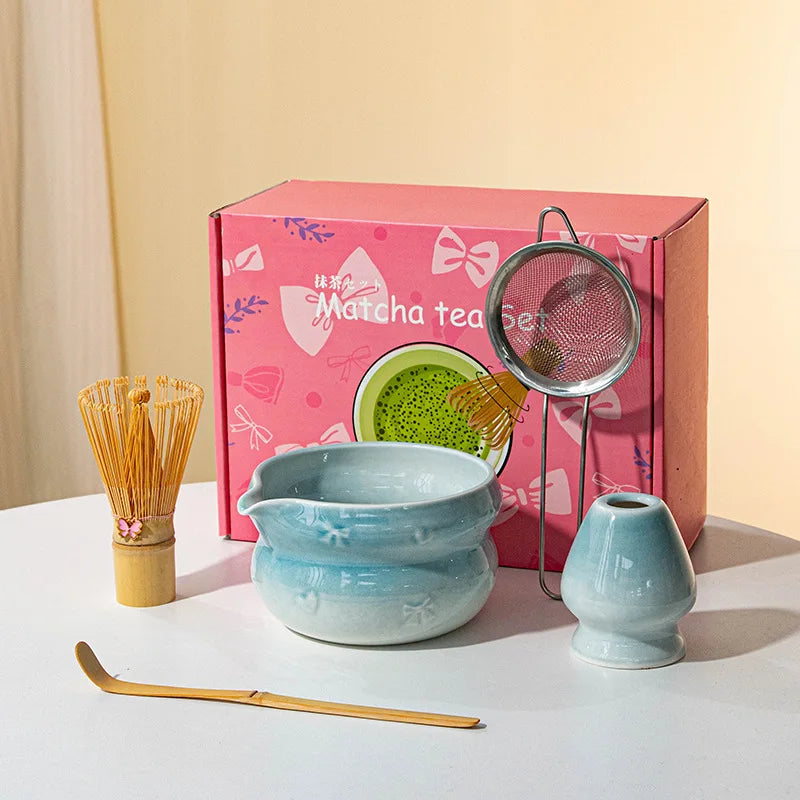 Elegant 7-piece matcha set featuring a beautifully crafted ceramic bowl and whisk, adorned with delicate cherry blossom designs. The set includes a bowl, whisk 8