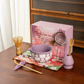 Elegant 8-piece matcha tea set featuring a delicate cherry blossom bowl. Includes a matcha whisk, scoop, and sifter, all crafted from 6