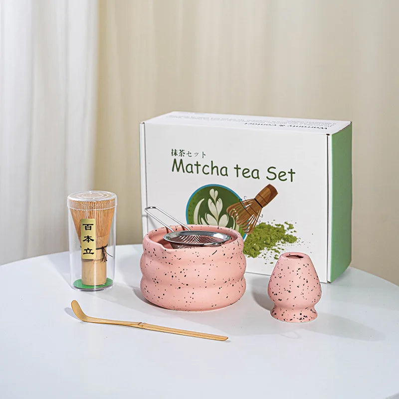 Elegant matcha tea set featuring a handmade ceramic bowl in a soft green hue, accompanied by a traditional bamboo whisk, perfect for tea enthusiasts and makes a 2