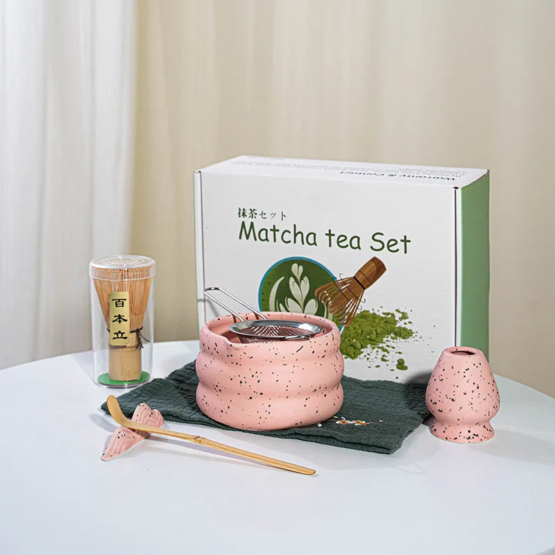 Elegant matcha tea set featuring a handmade ceramic bowl in a soft green hue, accompanied by a traditional bamboo whisk, perfect for tea enthusiasts and makes a 6